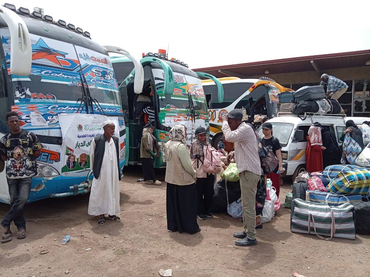 انطلاق 15 بص من القاهرة تقل سودانيين عائدين إلى البلاد